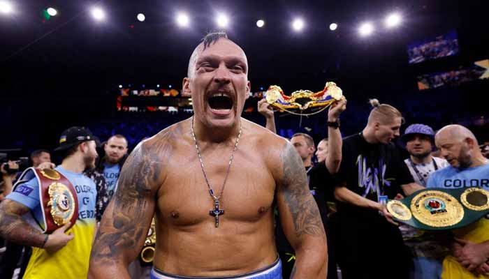 Oleksandr Usyk celebrates winning his fight against Anthony Joshua. — Reuters