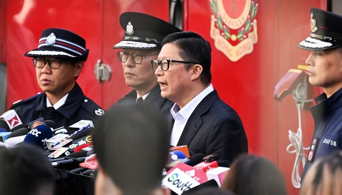 Chris Tang, Secretary for Security of Hong Kong, speaks to the media at the site in the aftermath of a major fire that swept through several apartment blocks at the Wang Fuk Court residential estate in Hong Kongs Tai Po district on November 28, 2025. — AFP