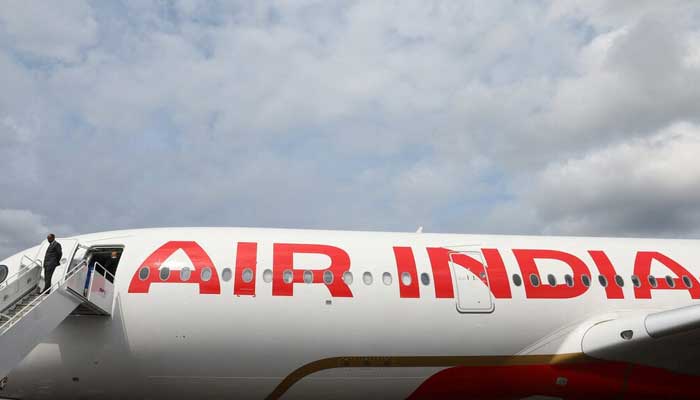 Branding for Air India is seen on an Airbus A350-900 at the Farnborough International Airshow, in Farnborough, Britain, July 24, 2024. — Reuters