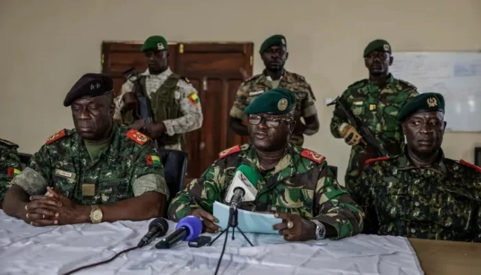 Brigadier General Denis NCanha, head of the military office of the Guinea-Bissau presidency, announces the government takeover on November 26, 2025. — AFP