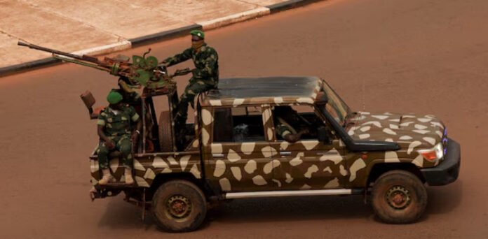 General sworn in as Guinea-Bissau leader in swift coup after disputed vote