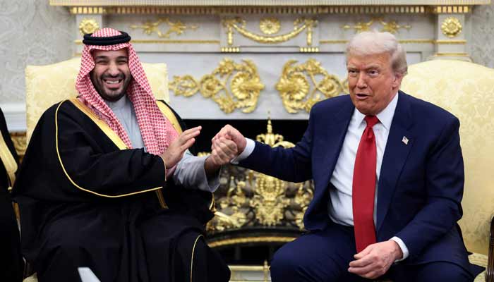 US President Donald Trump and Saudi Crown Prince and Prime Minister Mohammed bin Salman hold hands during a meeting in the Oval Office at the White House in Washington, DC, US, November 18, 2025. — Reuters