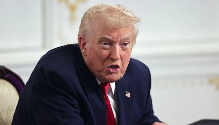US President Donald Trump speaks with members of the media following a call with military service members, on Thanksgiving, in Palm Beach, Florida, US, November 27, 2025. — Reuters