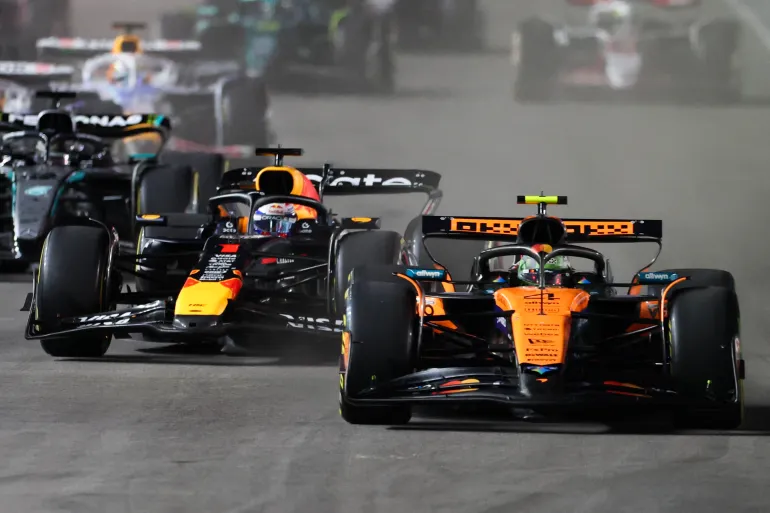Lando Norris and Max Verstappen in action.