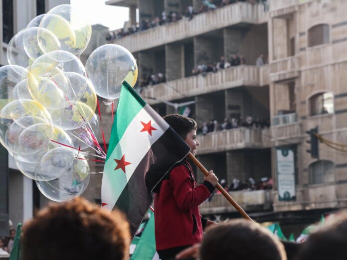 Hope, flags, fireworks as Syria starts to celebrate a year without al-Assad | Syria's War News