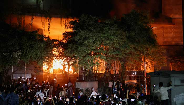 A group of people set fire to The Daily Star newspaper office building, following the death of Sharif Osman Hadi, a student leader who had been receiving treatment in Singapore after being shot in the head, in Dhaka, Bangladesh, December 19, 2025. — Reuters