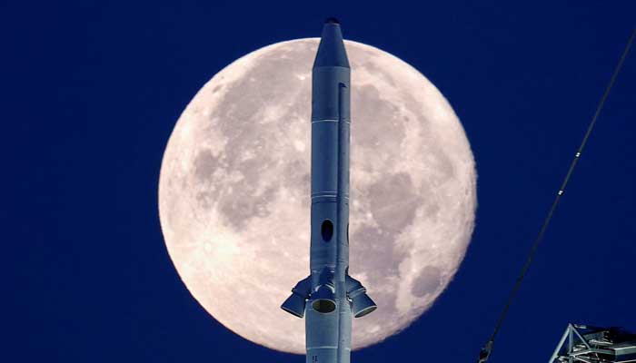 A full moon, known as the Strawberry Moon is shown with the top of NASA’s next-generation moon rocket, the Space Launch System Artemis 1, at the Kennedy Space Center in Cape Canaveral, Florida, US. — Reuters/File