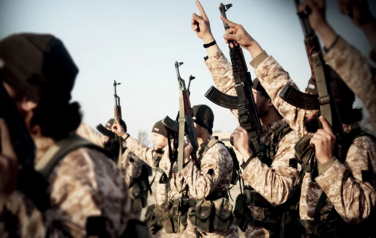 Nov. 19, 2015 - Raqqa, Syria - Islamic State of Iraq and the Levant propaganda photo showing masked militants in Syria. (Credit Image: © Dabiq/Planet Pix via ZUMA Wire)
