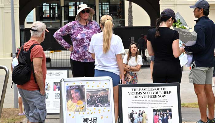 Mourners visit the site of the memorial after the clean up of floral tributes outside the Bondi Pavilion following seven days of mourning in Sydney on December 22, 2025. — AFP