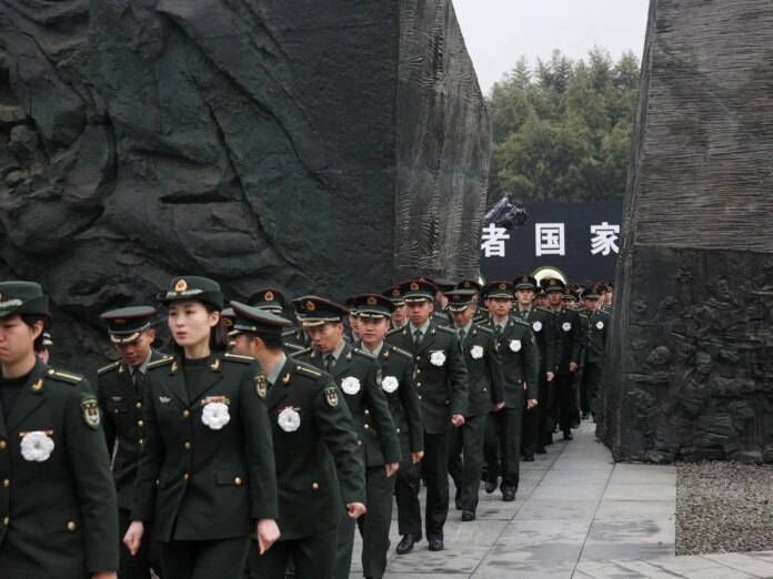 China holds low-key Nanjing Massacre memorial without Xi amid Japan row | News