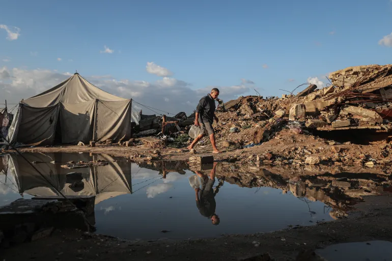Flooding hits displaced Palestinians’ tents after heavy rain in Gaza