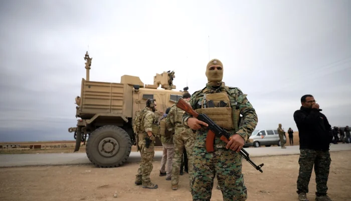 Syrian forces and US troops are seen during a patrol near Turkish border in Hasakah, Syria. — Reuters/File