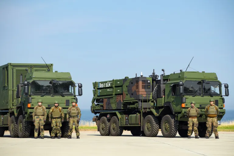 KIEL, GERMANY - SEPTEMBER 4: Soldiers standing guard in front of a IRIS-T SLM air defence system prior to the arrival of German Chancellor Olaf Scholz, Defence Minister Boris Pistorius and Lt. General Ingo Gerhartz, commander of the German air force (Inspekteur der Luftwaffe) during the operative launch of the Bundeswehr's first IRIS-T SLM air defence system at the Todendorf military base on September 4, 2024 in Panker, Germany. IRIS-T SLM, developed by Diehl Defence, is a medium-range system capable of bringing down drones, aircraft and missiles. Germany has already supplied Ukraine with at least three of the systems. (Photo by Gregor Fischer/Getty Images)