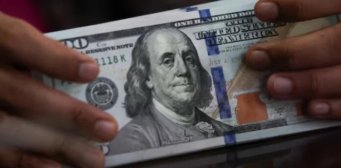US dollar gains as investors brace for 'hawkish' Fed this week