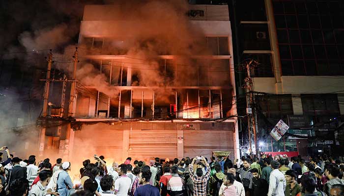 A group of people set fire to the Prothom Alo newspaper office in Karwan Bazar, following the death of Sharif Osman Hadi, a student leader who had been receiving treatment in Singapore after being shot in the head, in Dhaka, Bangladesh, December 19, 2025. — Reuters