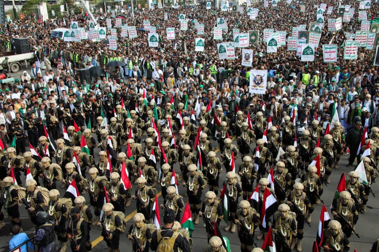 Houthi fighters join protesters, mainly Houthi supporters, as they demonstrate to show support to Palestinians in Gaza at Sabeen Square in Sanaa, Yemen August 29, 2025. REUTERS/Stringer