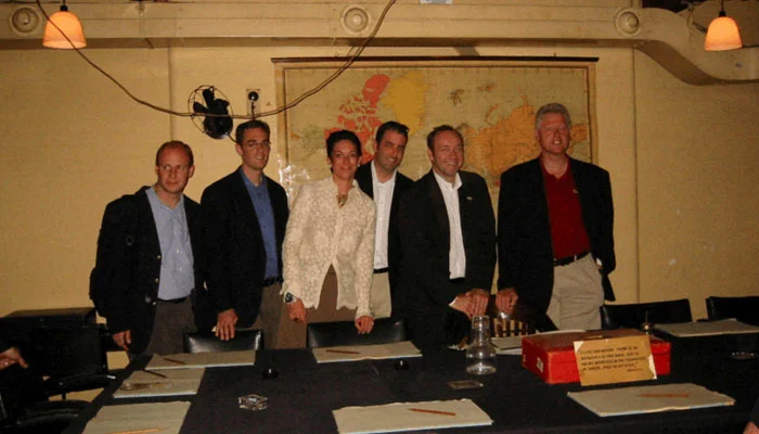 Former US president Bill Clinton and Ghislaine Maxwell are seen in this image from the estate of late financier and convicted sex offender Jeffrey Epstein, released by the Department of Justice in Washington, DC, US, on December 19, 2025. — Reuters