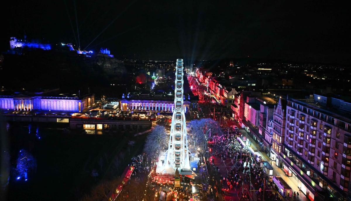 People crowd Princes Street during the Hogmanay street party to see in the New Year in Edinburgh on December 31, 2025. — AFP