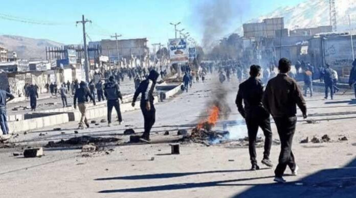 Two security officials killed, 30 injured as enraged protesters open fire in Iran