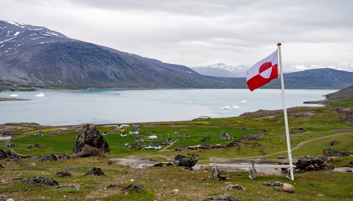 Greenlands flag flies in Igaliku settlement, Greenland, July 5, 2024. — Reuters