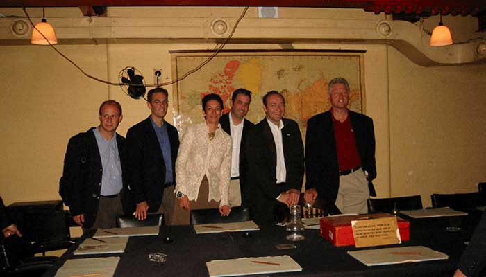 Former US President Bill Clinton and Ghislaine Maxwell are seen in this image from the estate of late financier and convicted sex offender Jeffrey Epstein, released by the Department of Justice in Washington, DC, US, on December 19, 2025. — Reuters