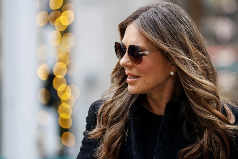 British actress Elizabeth Hurley arrives outside the High Court in London on January 19, 2026, ahead of the pre-trial hearing in a case pitting Britain's Prince Harry, Hurley and five other high-profile complainants against a major UK newspaper group. 