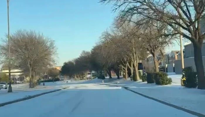 A view of a snow-covered road in Texas, US. — Reporter