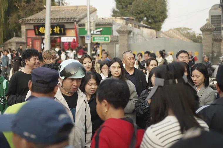 File - People on the streets of Beijing on Oct. 1st 2024.