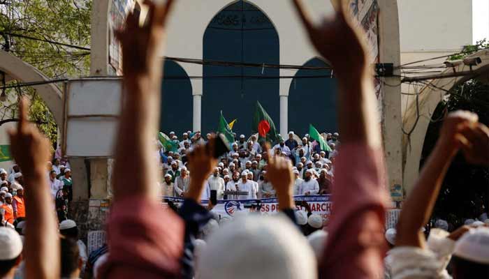 Members of the Islami Andolan Bangladesh, a political party, join in a mass protest march towards the Election Commission, ahead of the election schedule declaration, in Dhaka, Bangladesh. — Reuters/File