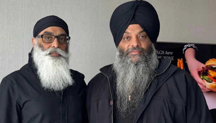 Khalistani Sikh activist Paramjeet Singh Pamma (right) poses with fellow activist. — Reporter