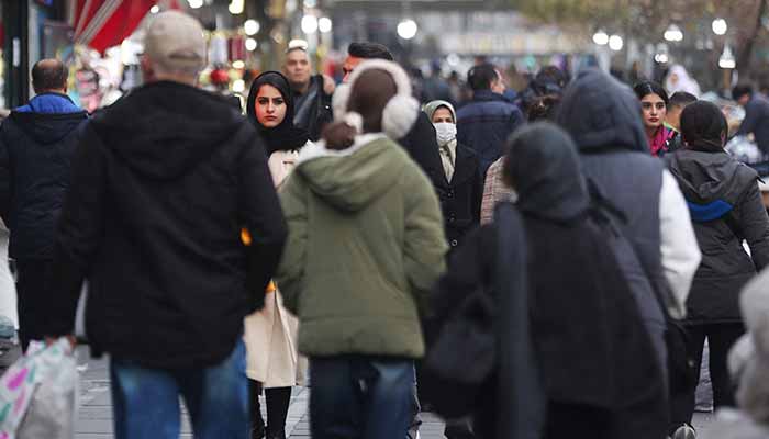 People walk on a street as protests erupt over the collapse of the currencys value in Tehran, Iran, January 2, 2026. — Reuters