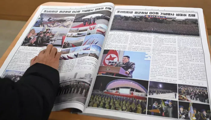 A visitor reads Rodong Sinmun, North Koreas top newspaper, at the National Library of Korea in Seoul on January 2, 2026. — AFP