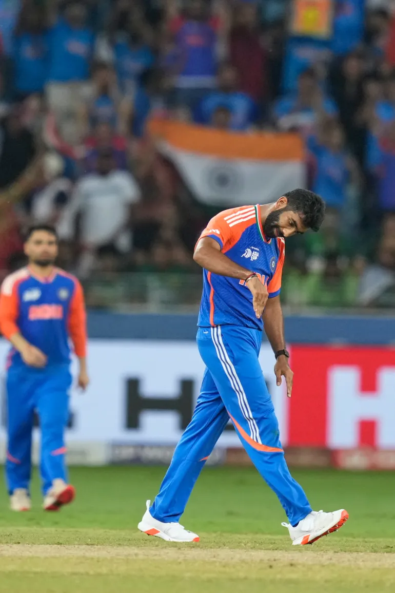 India's Jasprit Bumrah celebrates the wicket of Pakistan's Haris Rauf during the Asia Cup cricket final between India and Pakistan at Dubai International Cricket Stadium, United Arab Emirates, Sunday, Sept. 28, 2025. (AP Photo/Altaf Qadri)