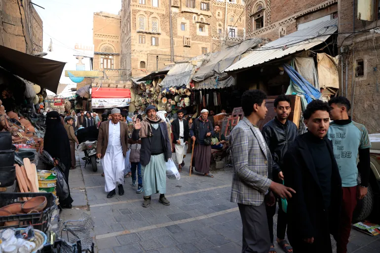 epa12751633 People walk through a market ahead of the fasting month of Ramadan in Sana'a, Yemen, 17 February 2026. Ramadan is expected to begin on 18 February 2026, depending on the sighting of the new crescent moon. Muslims around the world celebrate the holy month of Ramadan by praying during the nighttime and abstaining from eating, drinking, and sexual acts during the period between sunrise and sunset. EPA/YAHYA ARHAB