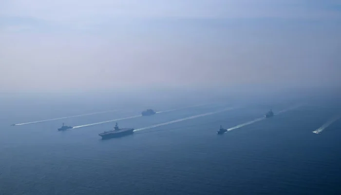 The US Navys Nimitz-class aircraft carrier USS Abraham Lincoln leads its strike group during a photo exercise in the Arabian Sea, February 6, 2026. — Reuters