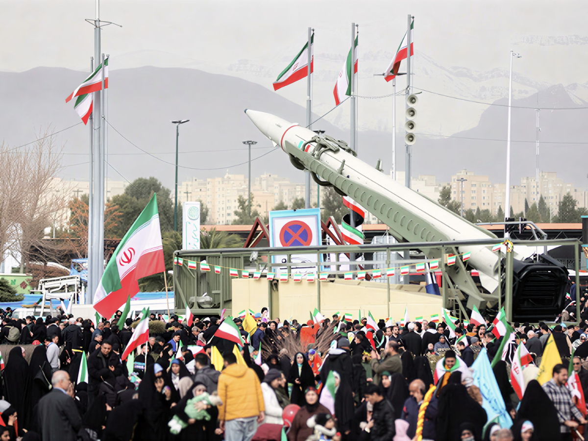 [1/2] People gather near a missile on display during the 47th anniversary of the Islamic Revolution in Tehran, Iran February 11, 2026. PHOTO: REUTERS