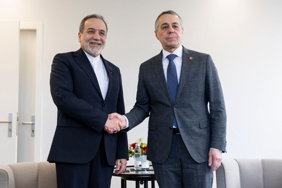 Switzerland's Foreign Minister Federal councillor Ignazio Cassis (R) meets with Iranian Foreign Minister Abbas Araghchi during a bilateral meeting between Switzerland and Iran, in Geneva, Switzerland on February 17, 2026. PHOTO: AFP