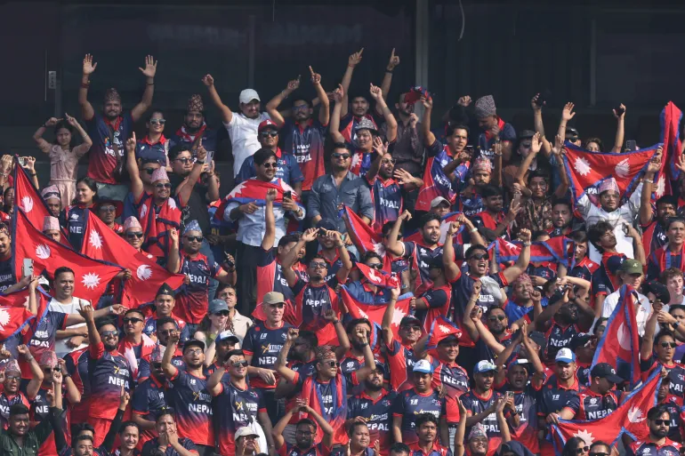 MUMBAI, INDIA - FEBRUARY 08: Supporters cheer during the ICC Men's T20 World Cup India & Sri Lanka 2026 match between England and Nepal at Wankhede Stadium on February 08, 2026 in Mumbai, India. (Photo by Pankaj Nangia/Getty Images)