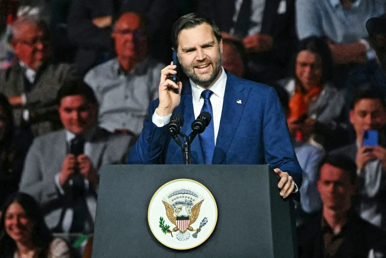 Vice President JD Vance speaks on a call with President Donald Trump during a campaign rally in Budapest, Hungary on April 7, 2026. 