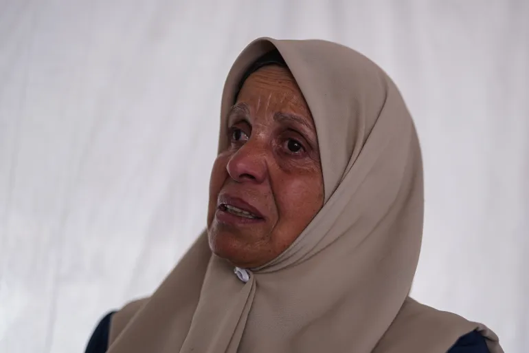 Ina’am feels deep anxiety about the lives of her imprisoned sons amid escalating conditions in the prisons and the approval of a law enabling the execution of prisoners in Israeli jails [Omar Ashtawy/ Al Jazeera]