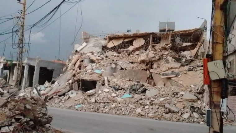 Ali Eid, a high school instructor from Maarakah, found his house and most of the village reduced to rubble.