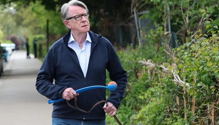 Former British ambassador to the US Peter Mandelson walks with his dog outside his residence, on the day that Britains Prime Minister Keir Starmer is expected to make a statement on the vetting process for Peter Mandelsons appointment as British Ambassador to the United States, in London, Britain, April 20, 2026. — Reuters