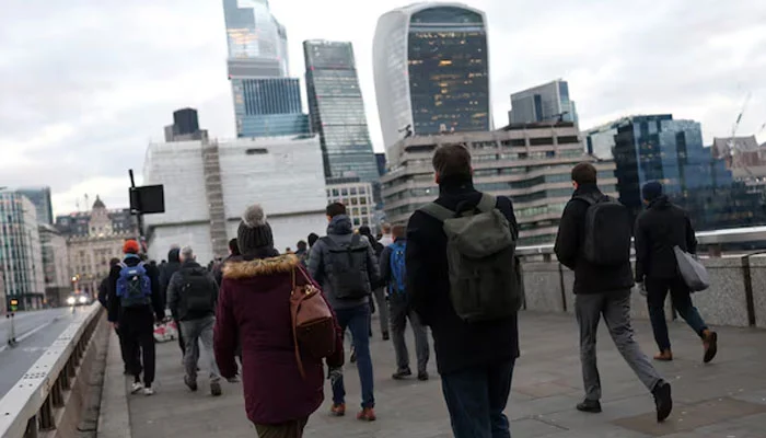 This representational image shows commuters cross London Bridge, in London, Britain, January 13, 2025. — Reuters