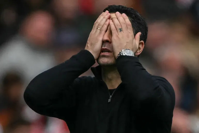 Arsenal's Spanish manager Mikel Arteta reacts during the English Premier League football match between Arsenal and Bournemouth at the Emirates Stadium in London on April 11, 2026. (Photo by Glyn KIRK / AFP) / RESTRICTED TO EDITORIAL USE. No use with unauthorized audio, video, data, fixture lists, club/league logos or 'live' services. Online in-match use limited to 120 images. An additional 40 images may be used in extra time. No video emulation. Social media in-match use limited to 120 images. An additional 40 images may be used in extra time. No use in betting publications, games or single club/league/player publications. /