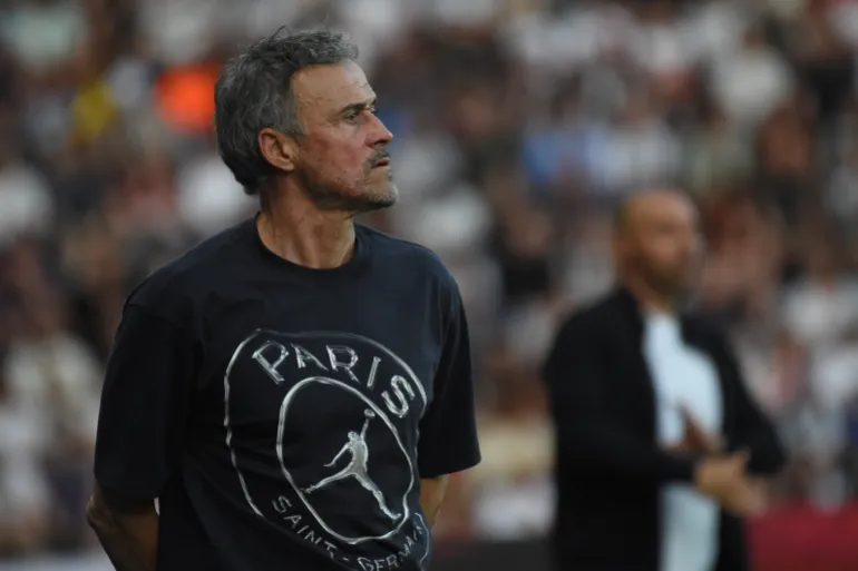 PSG's head coach Luis Enrique reacts during the French League One soccer match between Angers and Paris Saint-Germain in Angers, western France, Saturday, April 25, 2026. (AP Photo/Mathieu Pattier)