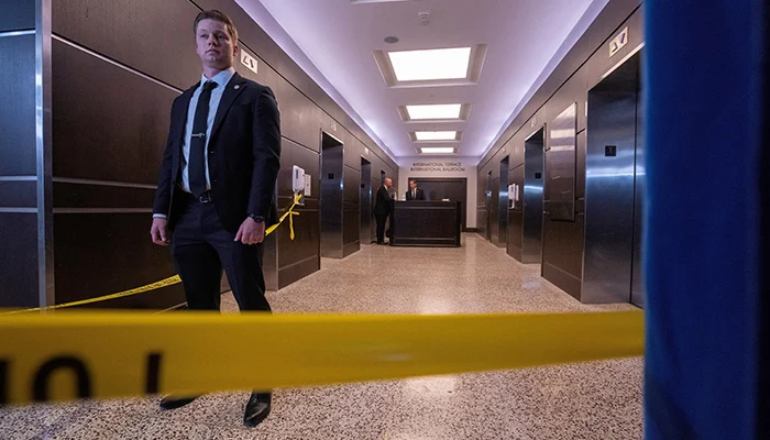 A secret service agent guards an area in the venue after a shooter opened fire during the annual White House Correspondents Association dinner in Washington, DC, US, April 25, 2026. — Reuters