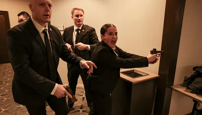 Security officials react as a shooter opens fire during the annual White House Correspondents Association dinner in Washington, D.C., U.S., April 25, 2026.— Reuters