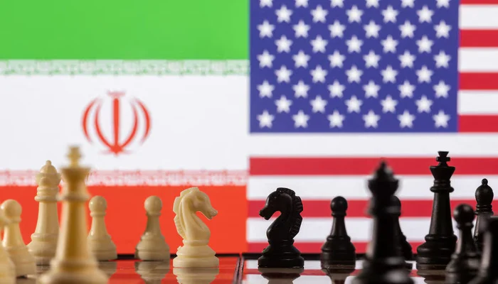 Chess pieces are seen in front of displayed Irans and U.S. flags in this illustration taken January 26, 2022. — Reuters