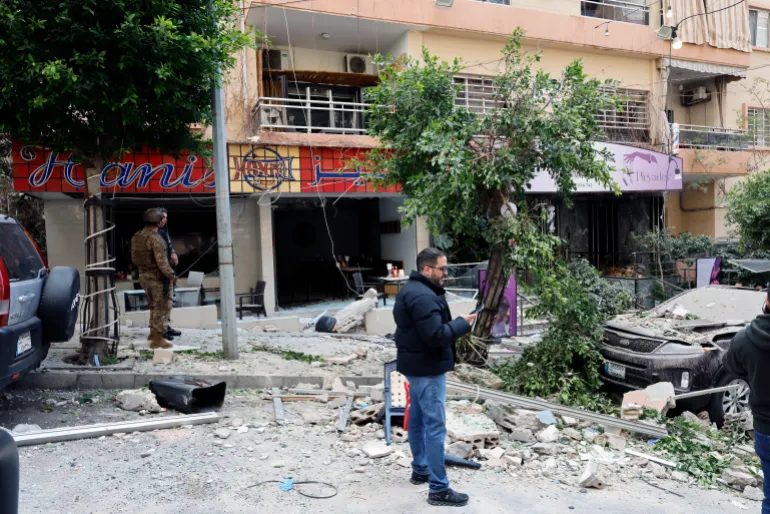 A damaged apartment building after an Israeli air strike in Caracas near Raouche district in Beirut,