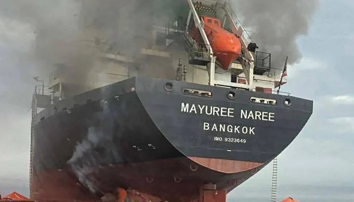 This handout photo taken on March 11, 2026 and released by the Royal Thai Navy shows smoke rising from the Thai bulk carrier Mayuree Naree near the Strait of Hormuz after an attack. — AFP